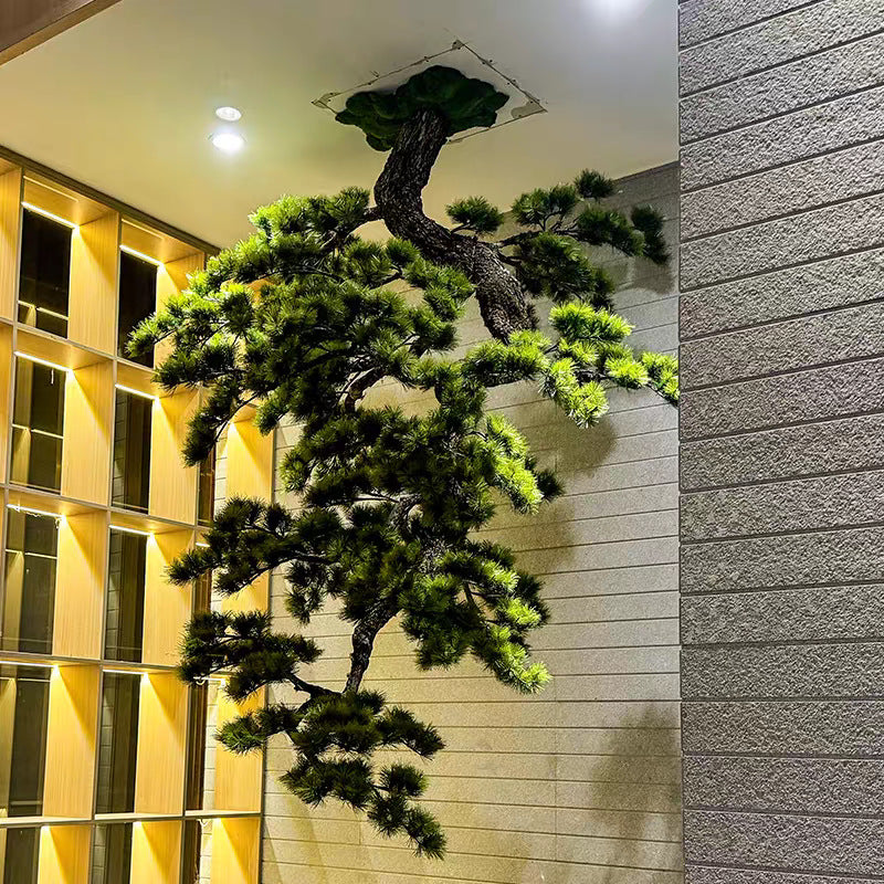 The hanging pine set high in a hotel atrium as a floating landscape feature