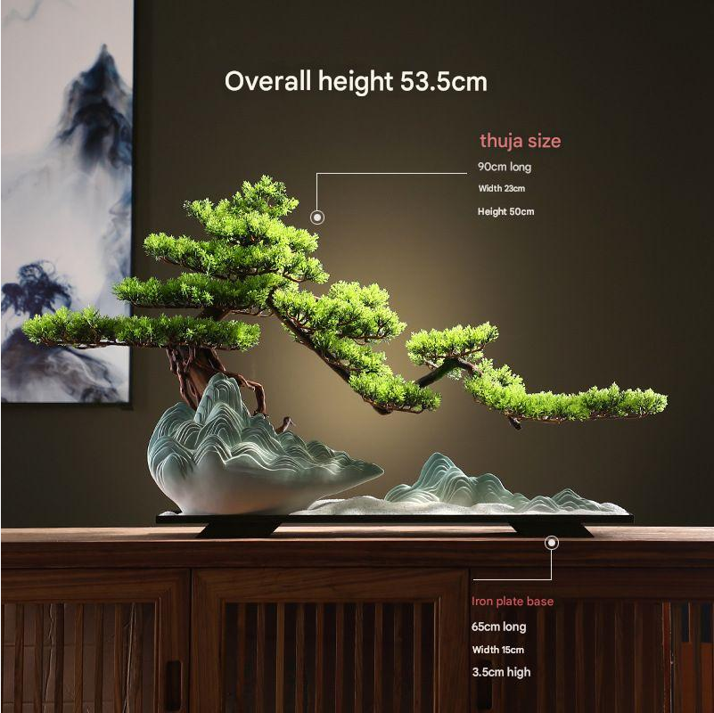 The 1.2ft bonsai set on a desk as a piece of low-maintenance greenery