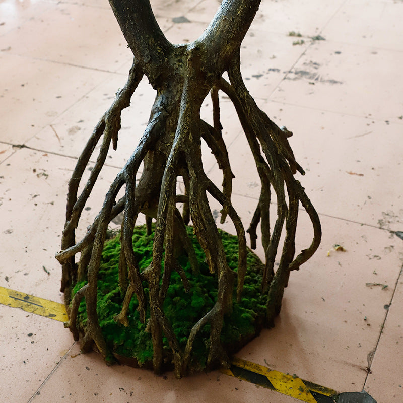 The 2.5m faux mangrove set into an indoor landscape display in a hotel lobby
