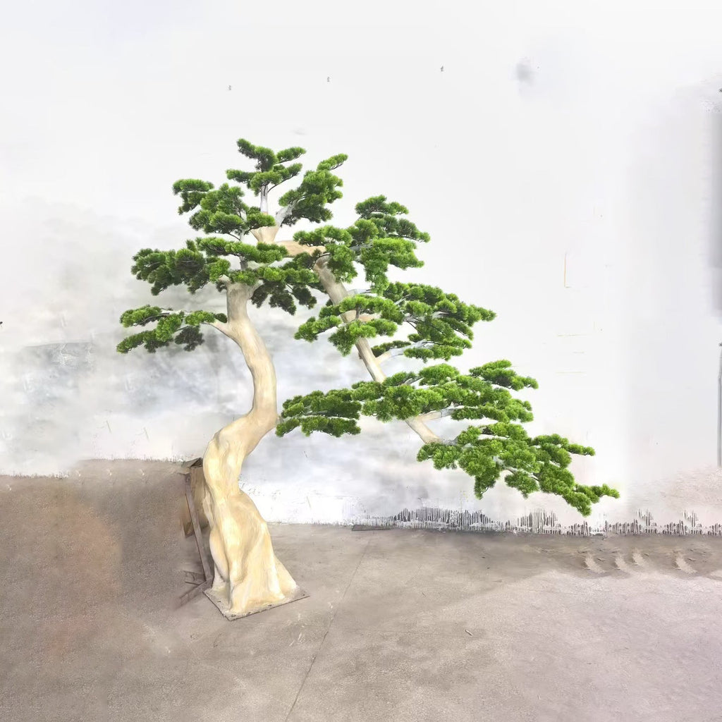 The welcome-pine bonsai used as a landscape feature at a hotel lobby entrance