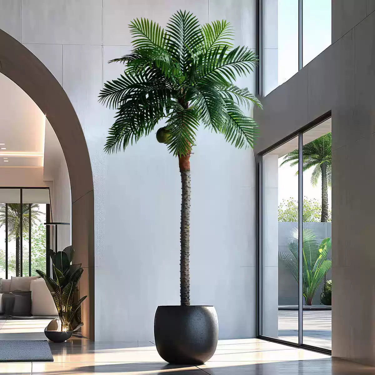 Single-trunk and double-trunk versions of the artificial palm shown side by side