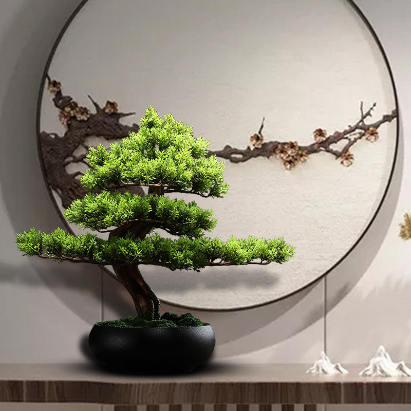 The 28in pine on an office desk as a small decorative green ornament piece