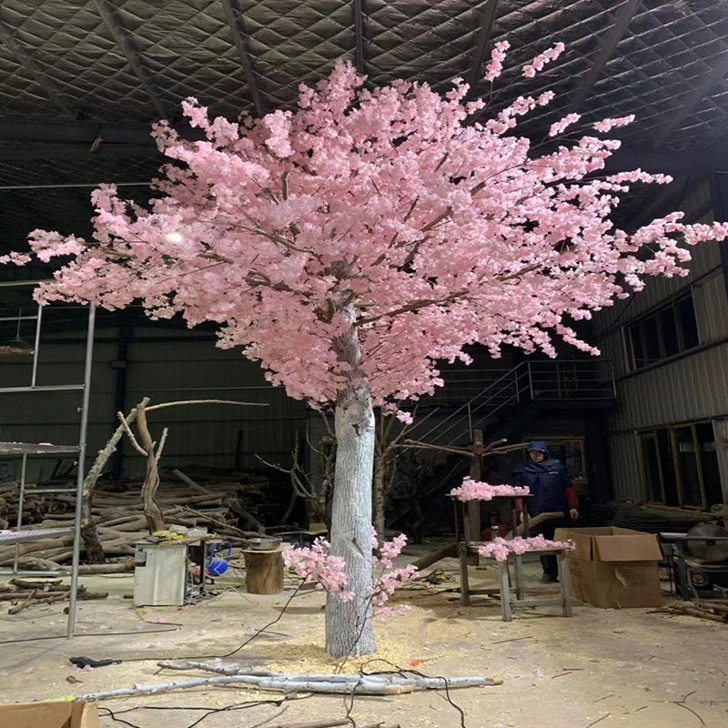 The branch frame of the 5ft faux sakura tree showing through the massed blossom