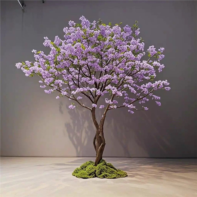 The branch structure of the blossom tree, flowers clustered along each stem