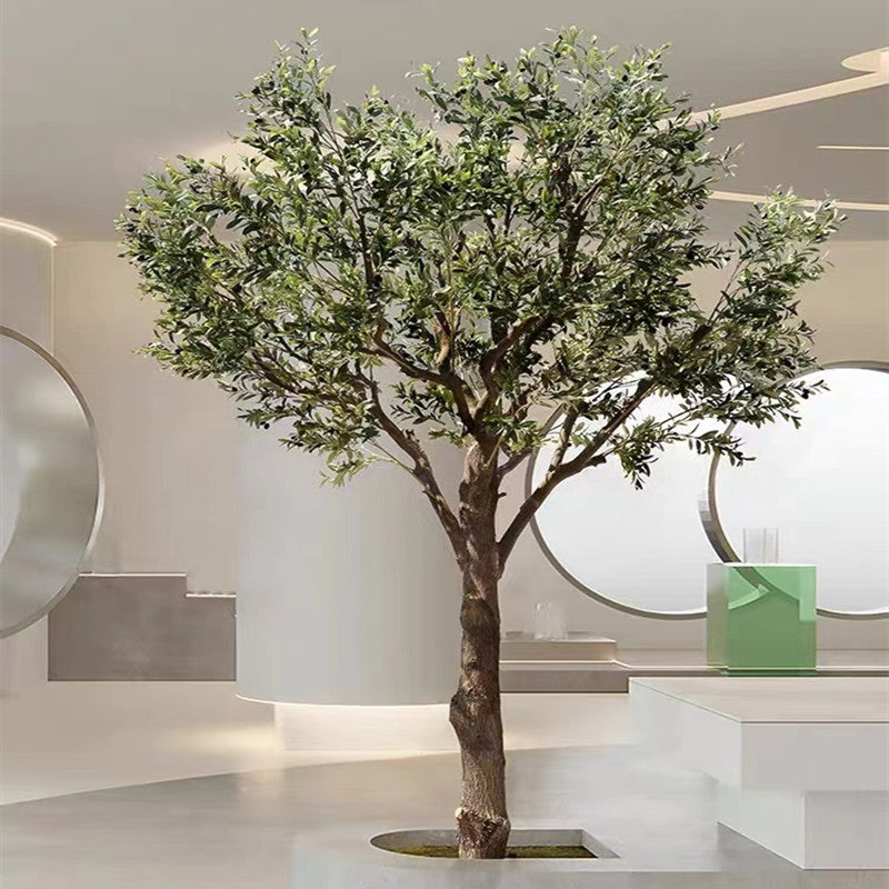Artificial olive tree 11.5ft tall in a Nordic style, silver-green foliage on slim limbs