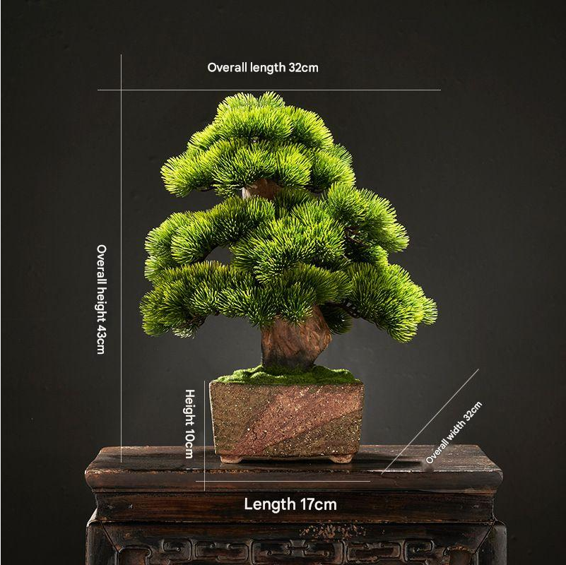 Artificial pine bonsai for the home, branches layered into flat trained pads