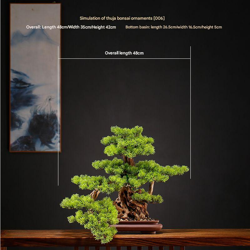 The bonsai in a hotel lobby as a low green accent beside a seating group