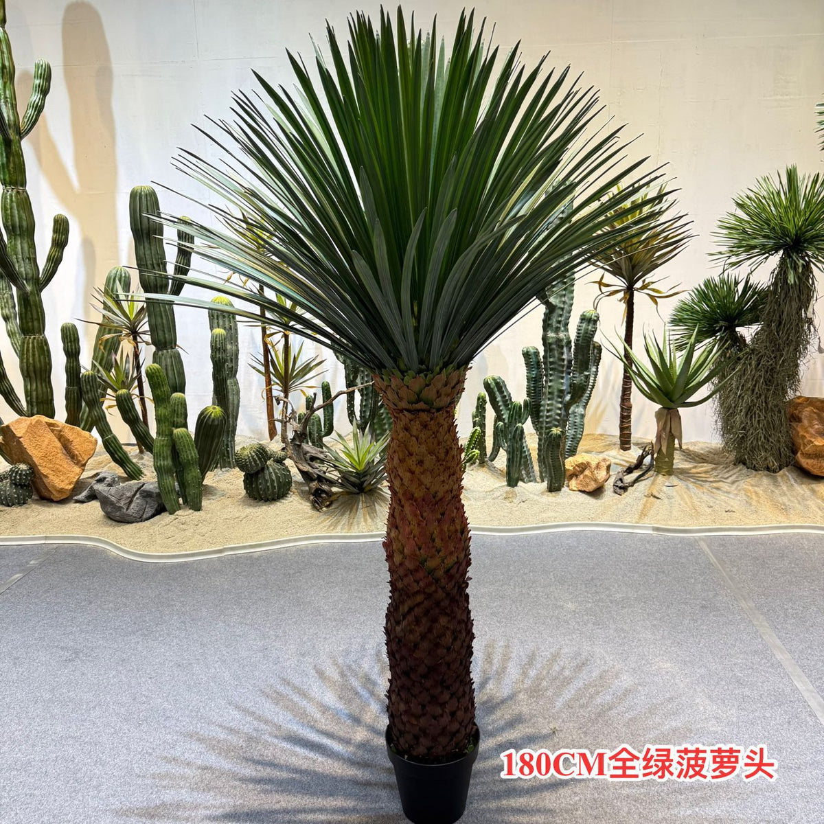 The faux pineapple head plant used as a feature in a store window display