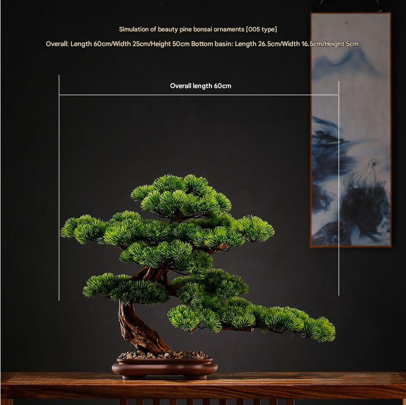 Artificial pine bonsai with branches trained into flat, layered green pads