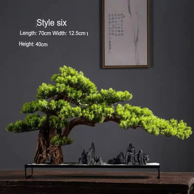 The 2ft bonsai used outdoors on a covered patio beside a wooden bench