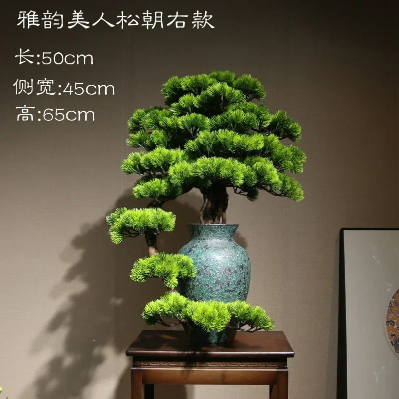 The 24in bonsai on a living room side table beside a small lamp