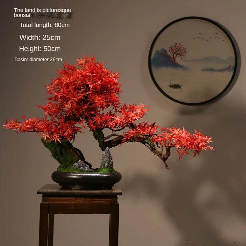 The bonsai used as a centrepiece on a low table in a pared-back room