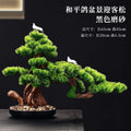 Artificial pine bonsai 2.5ft tall, potted, with branches trained into flat pads