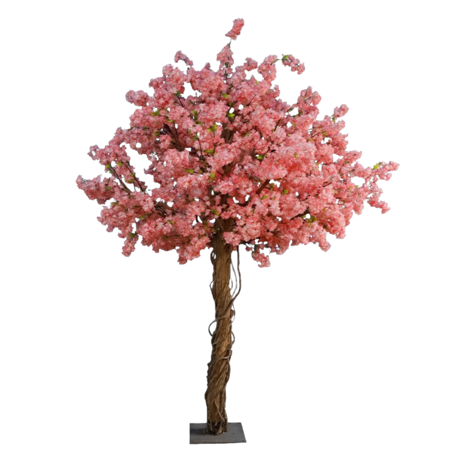 The cherry blossom tree set up as a backdrop behind a wedding ceremony aisle