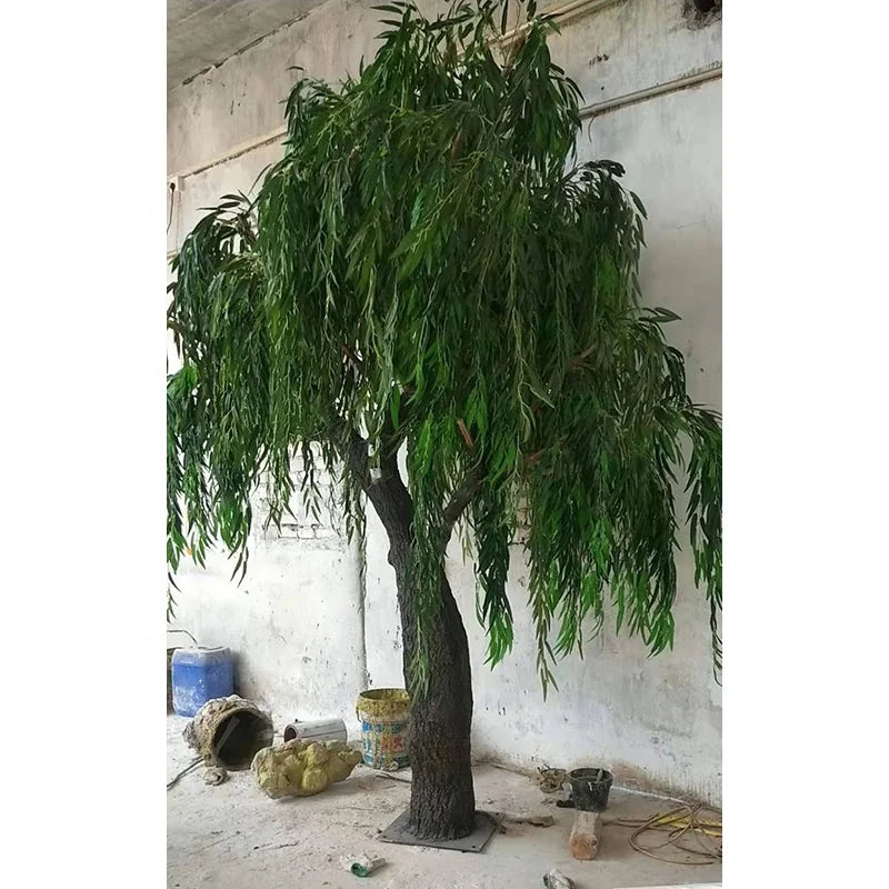Artificial weeping willow 13ft tall, trailing branches falling from a wide crown
