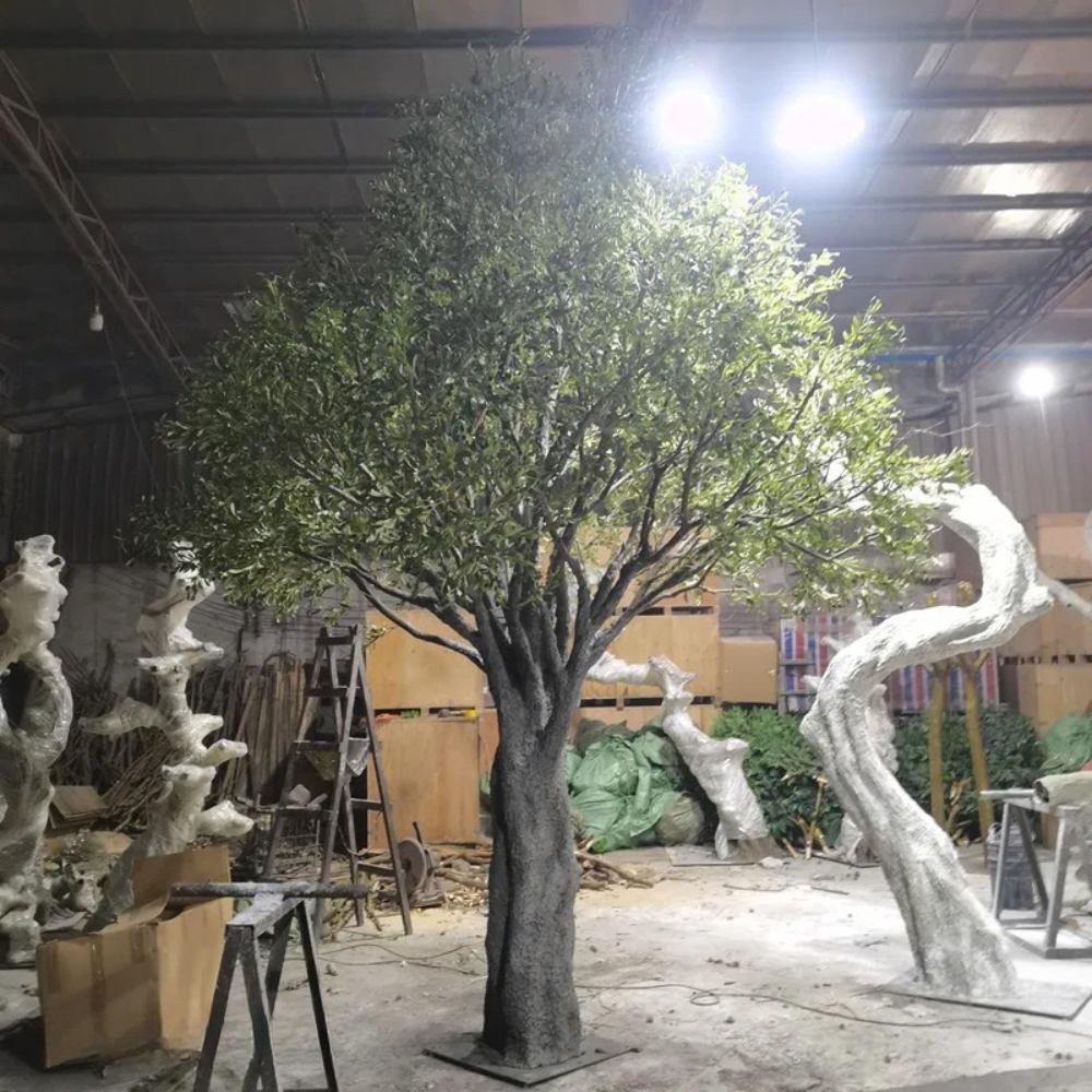 The trunk of the 4m olive tree, moulded with gnarled olive bark texture