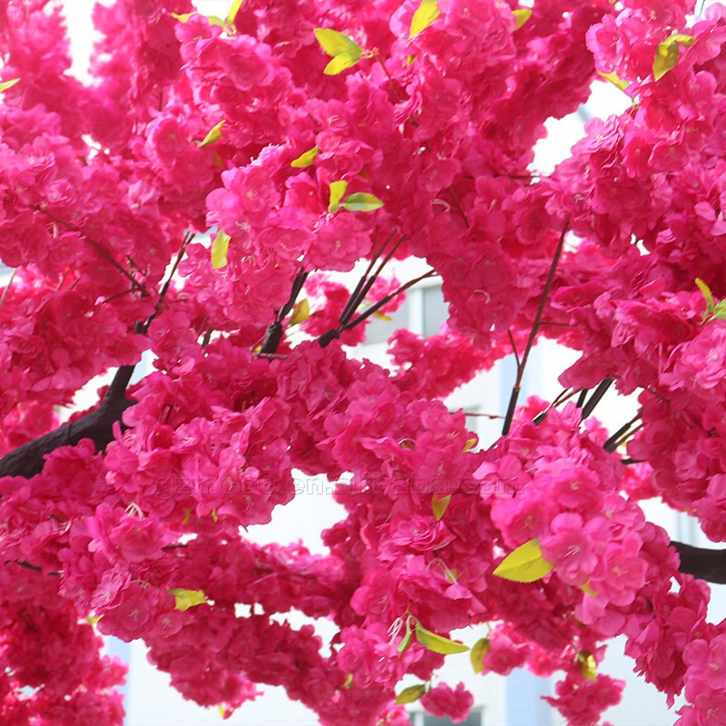 The same blossom tree used as a floral feature at a wedding reception