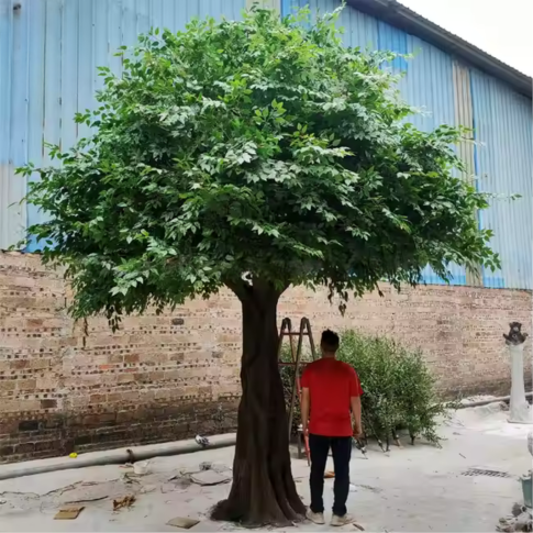 Artificial banyan tree on a fibreglass trunk, dense foliage over a wide crown