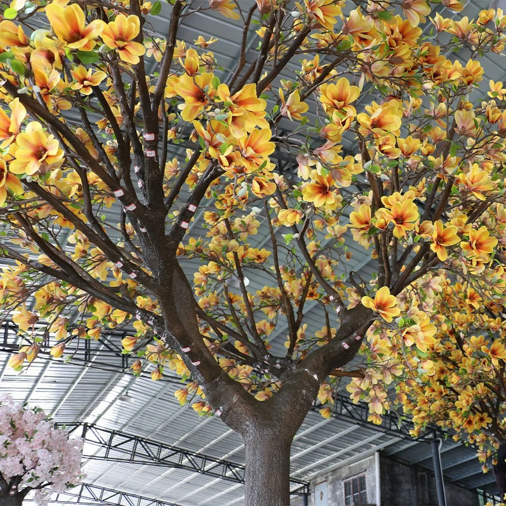 The 13ft blossom tree indoors with flowers reaching high above the floor