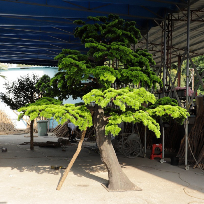 Artificial welcoming pine 10ft tall, branches trained flat in the classic style