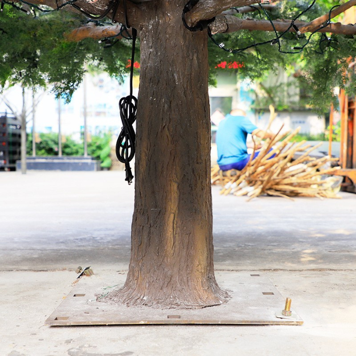 Pot and base of the 6ft snow-flocked artificial cedar tree, ready to dress