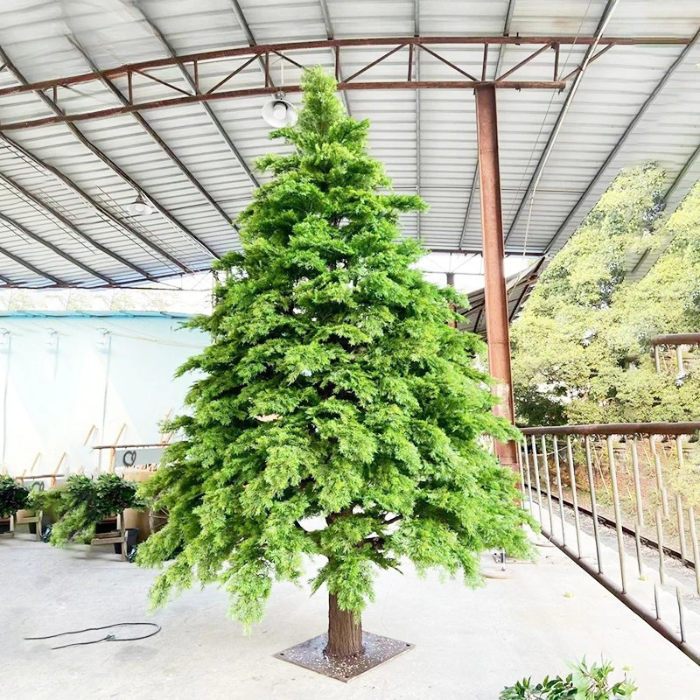 Artificial Christmas tree 10ft (3m) tall, LED lights threaded through the branches
