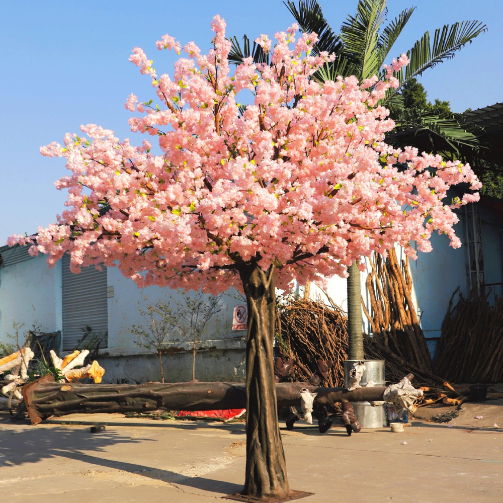 Artificial cherry blossom tree 11.5ft tall, blossom over a fibreglass trunk