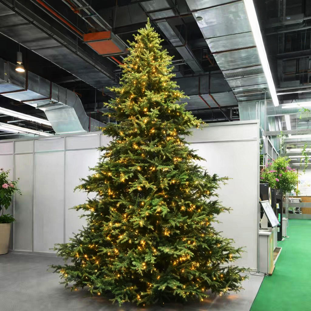 Metal frame and ground base of the giant red Christmas tree during installation