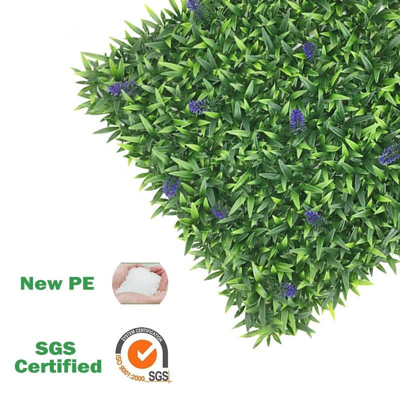 The UV-resistant grass panel on an outdoor wall in strong direct sunlight