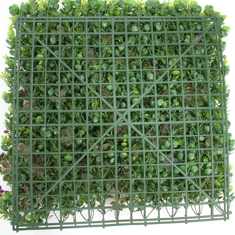Reverse of the 50x50cm commercial grass panel showing the grid backing and tabs