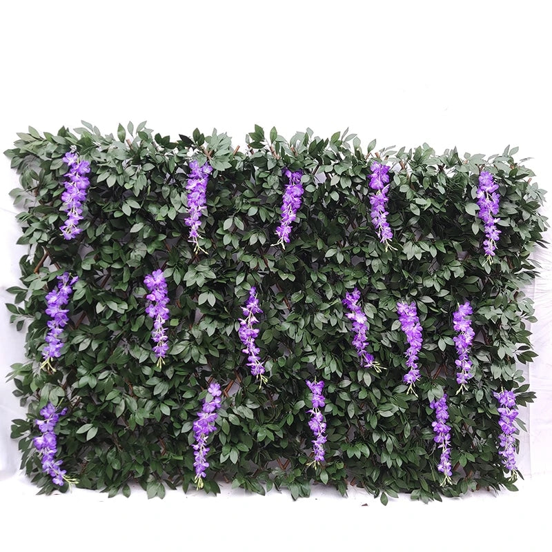 Artificial leaf screening on an expandable willow trellis, forming a green privacy panel