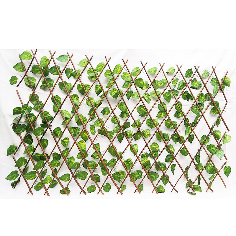 The trellis pulled open into its diamond lattice, showing the expandable joints