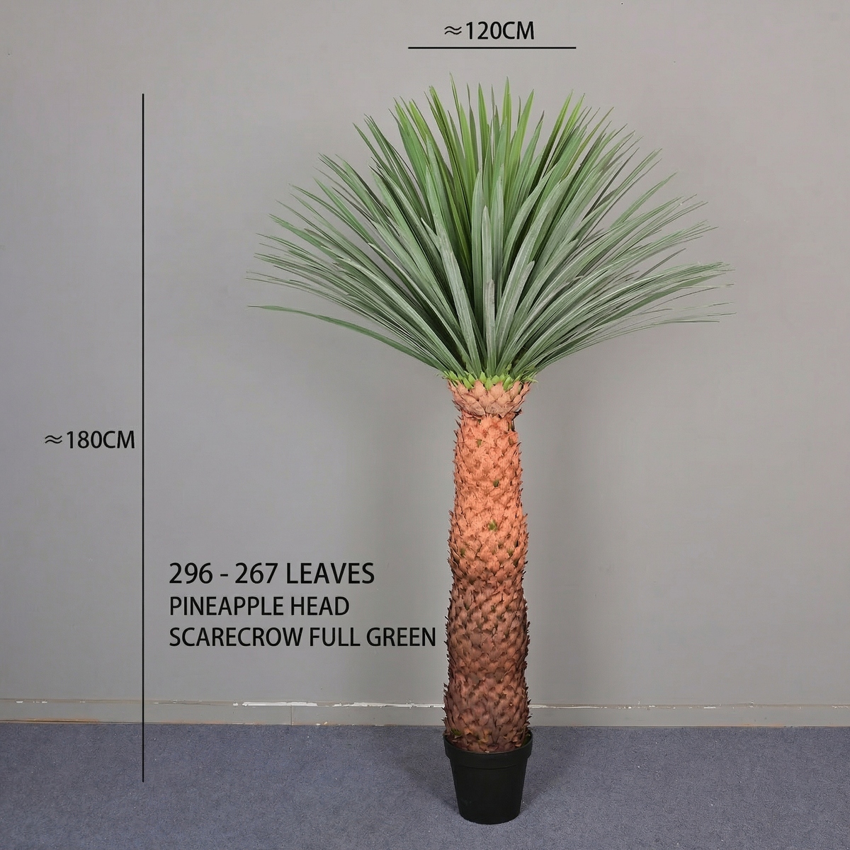 The 6ft faux plant standing in a hotel lobby against a pale plaster wall