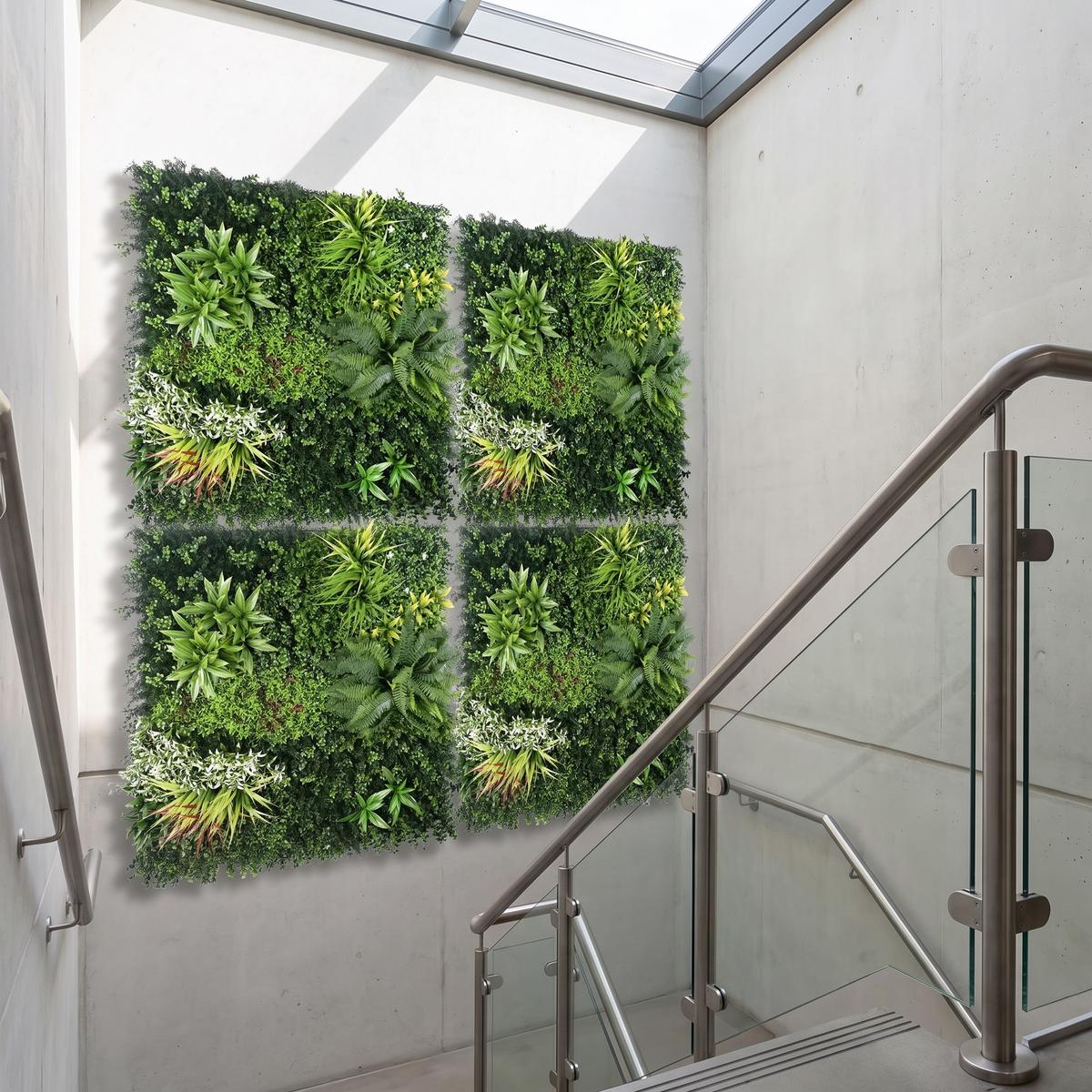 Vertical artificial grass wall panels in a stairwell atrium, shown at 3.3 x 3.3 ft
