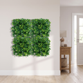 Artificial grass wall tiles in a residential entryway, shown at 1.6 x 1.6 ft