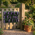 Willow expandable trellis privacy panel on a garden fence, shown at 1.0 x 3.3 ft