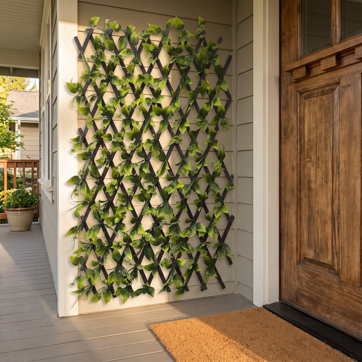 Artificial leaf expandable trellis panel on a porch corner