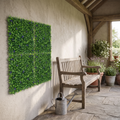UV resistant artificial grass wall tiles in a garden room