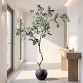 Artificial money tree with spring blossoms in a modern entrance hall