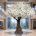 Artificial white sakura cherry blossom tree in a hotel atrium