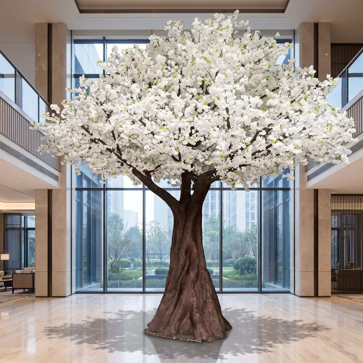 Artificial white sakura cherry blossom tree in a hotel atrium
