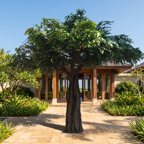 Artificial banyan ficus tree in an outdoor resort garden