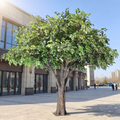 Large outdoor artificial ficus banyan tree on a public plaza