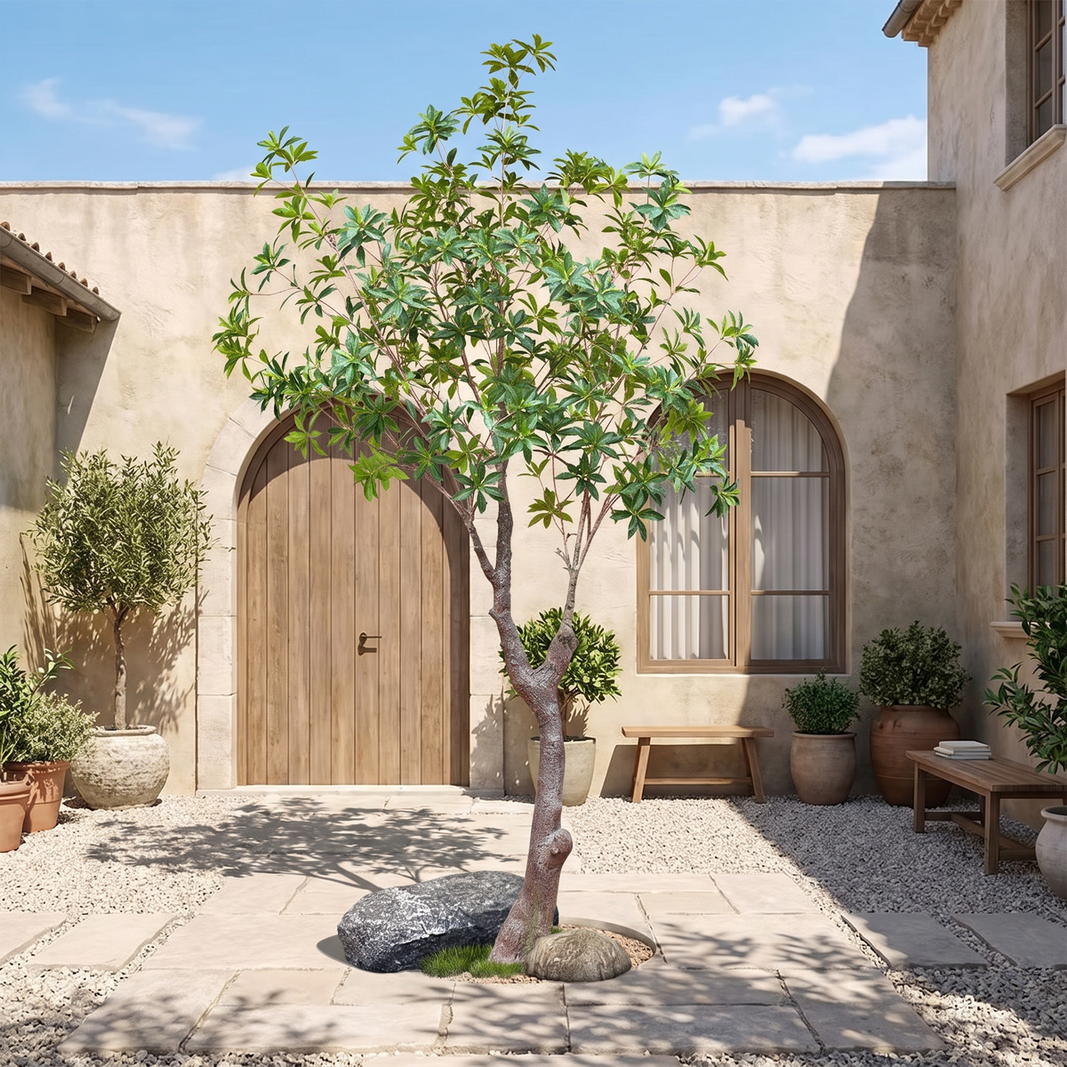 Artificial pieris japonica tree in an outdoor garden courtyard