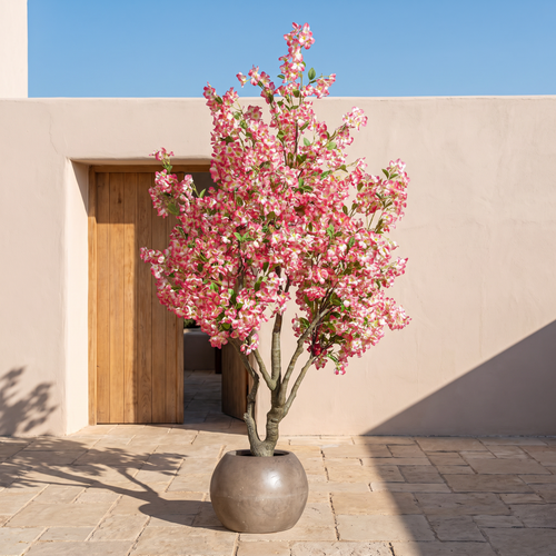 Artificial bougainvillea tree on an outdoor Mediterranean terrace