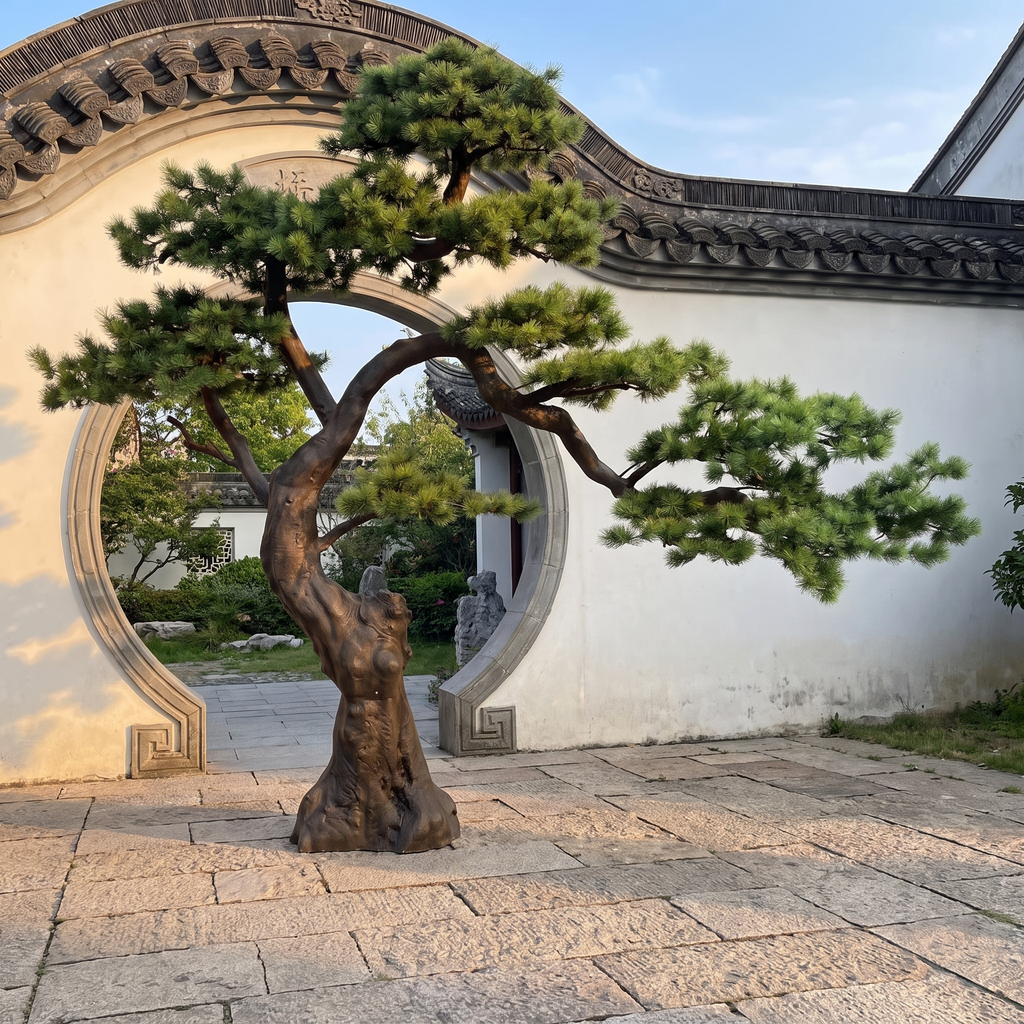 Large artificial welcome pine tree in an outdoor Chinese courtyard