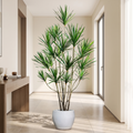 Artificial dracaena yucca tree in an apartment hallway