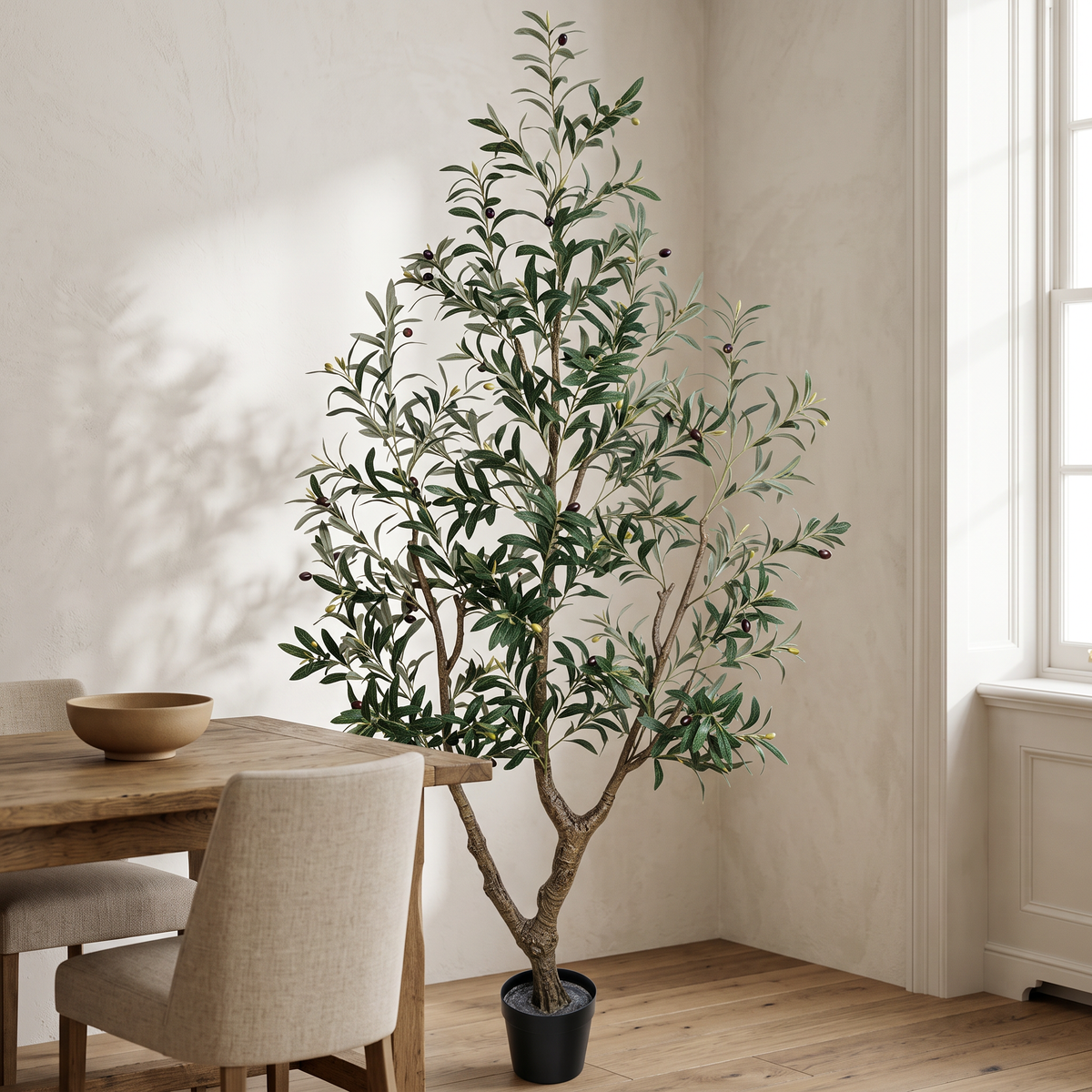 Artificial olive tree with a natural wood trunk and layered green canopy