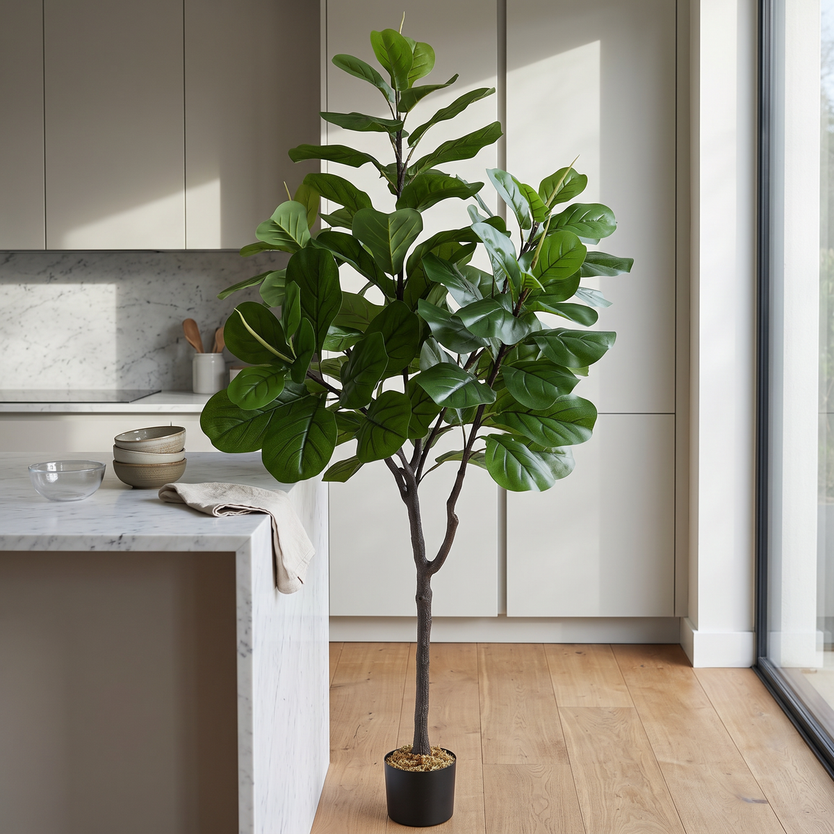 Artificial fiddle leaf fig tree in a black pot