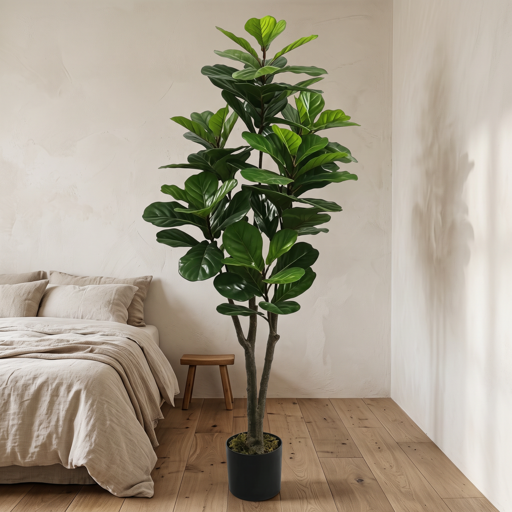 Artificial fiddle leaf fig tree with a textured trunk in a nested grower pot